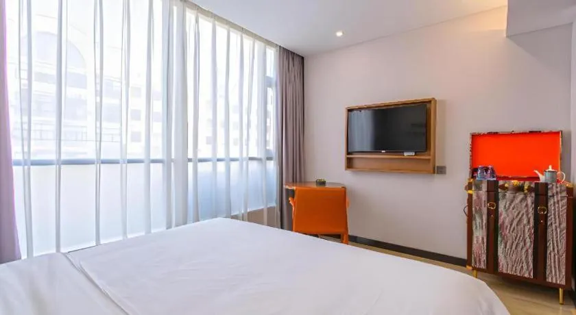 Bed in Premier City Comfort Hotel Yangzhou Shouxi Lake West Gate Weiyang Road Siji Garden