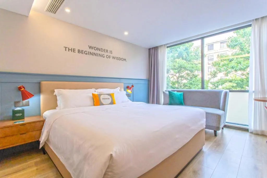 Bed in Premier City Comfort Hotel Yangzhou Shouxi Lake West Gate Weiyang Road Siji Garden