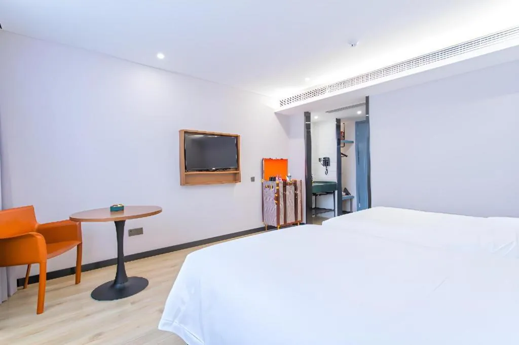 Bed in Premier City Comfort Hotel Yangzhou Shouxi Lake West Gate Weiyang Road Siji Garden