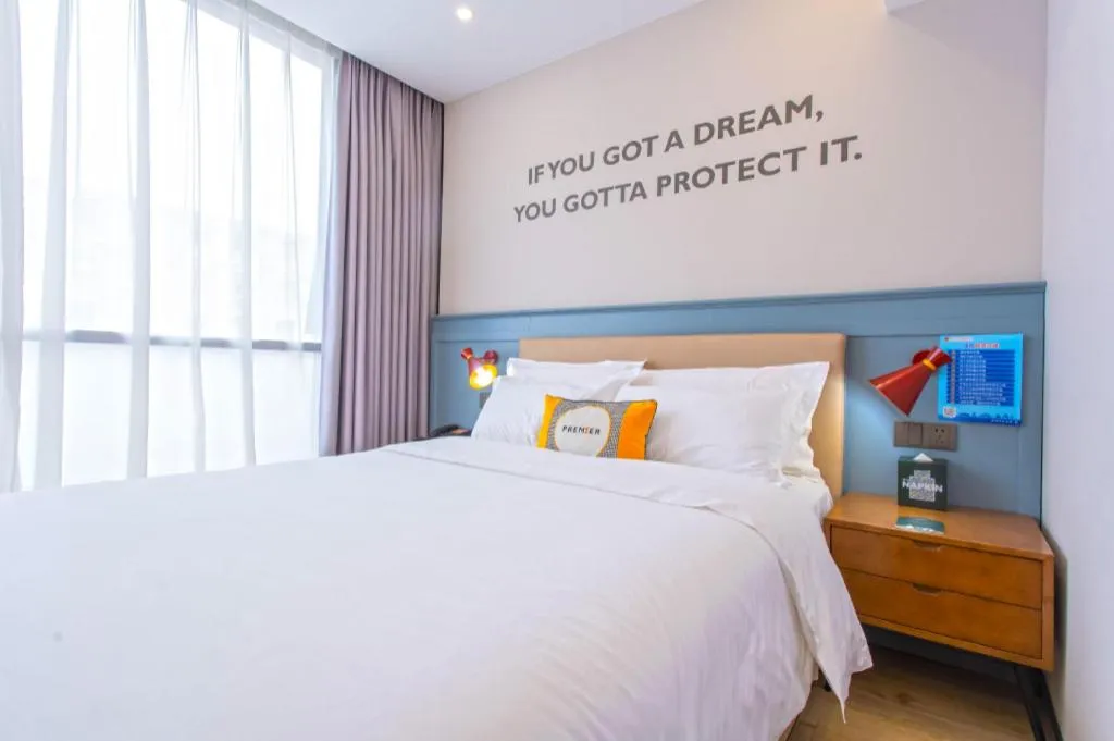 Bed in Premier City Comfort Hotel Yangzhou Shouxi Lake West Gate Weiyang Road Siji Garden