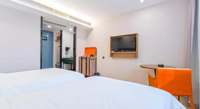 Bed in Premier City Comfort Hotel Yangzhou Shouxi Lake West Gate Weiyang Road Siji Garden