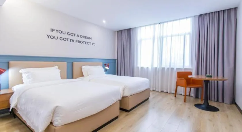 Bed in Premier City Comfort Hotel Yangzhou Shouxi Lake West Gate Weiyang Road Siji Garden