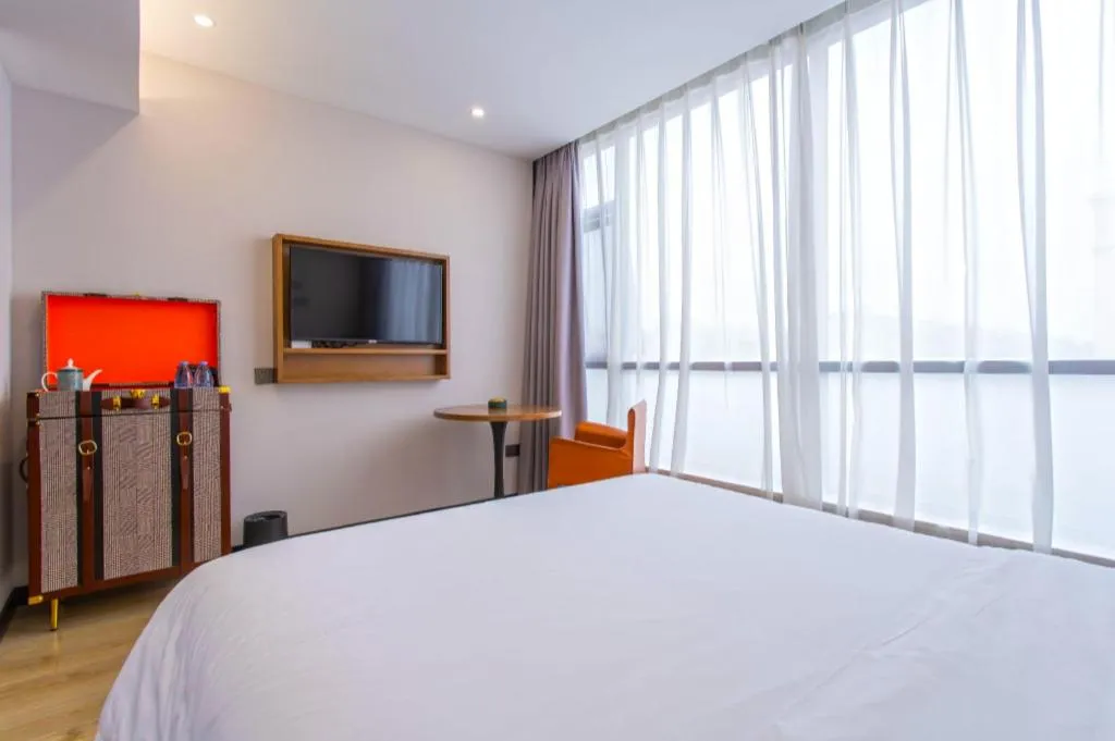 Bed in Premier City Comfort Hotel Yangzhou Shouxi Lake West Gate Weiyang Road Siji Garden