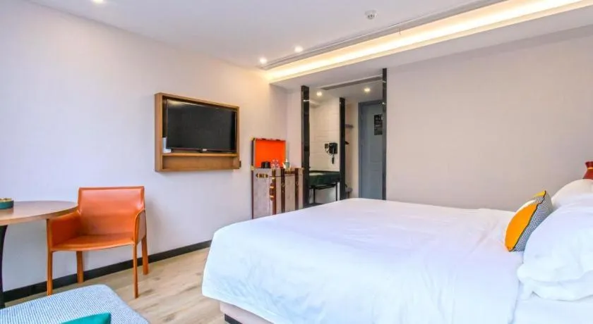 Bed in Premier City Comfort Hotel Yangzhou Shouxi Lake West Gate Weiyang Road Siji Garden