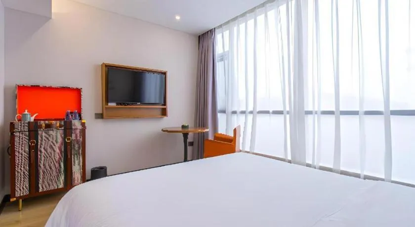 Bed in Premier City Comfort Hotel Yangzhou Shouxi Lake West Gate Weiyang Road Siji Garden