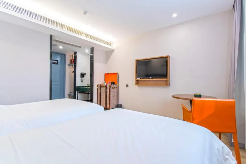Bed in Premier City Comfort Hotel Yangzhou Shouxi Lake West Gate Weiyang Road Siji Garden