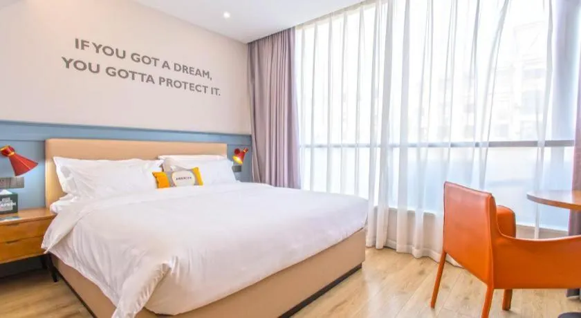 Bed in Premier City Comfort Hotel Yangzhou Shouxi Lake West Gate Weiyang Road Siji Garden