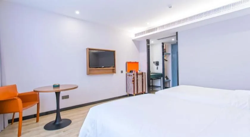 Bed in Premier City Comfort Hotel Yangzhou Shouxi Lake West Gate Weiyang Road Siji Garden