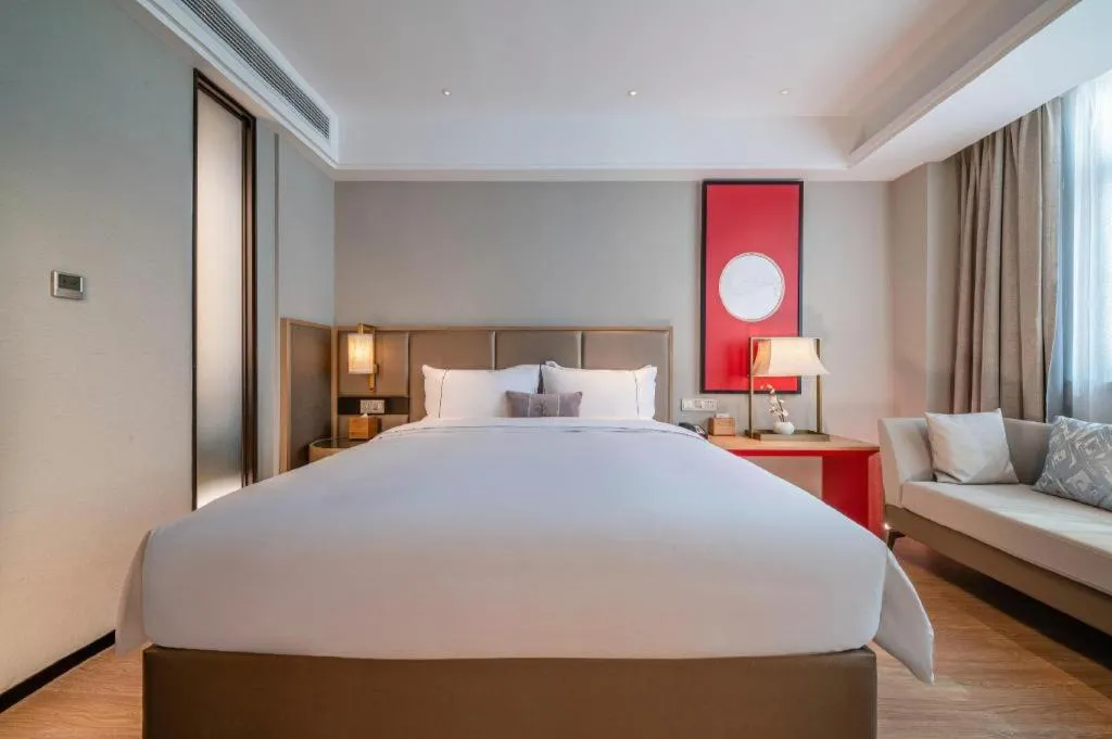 Bed in Echeng Hotel Hezhou Shizheng Square