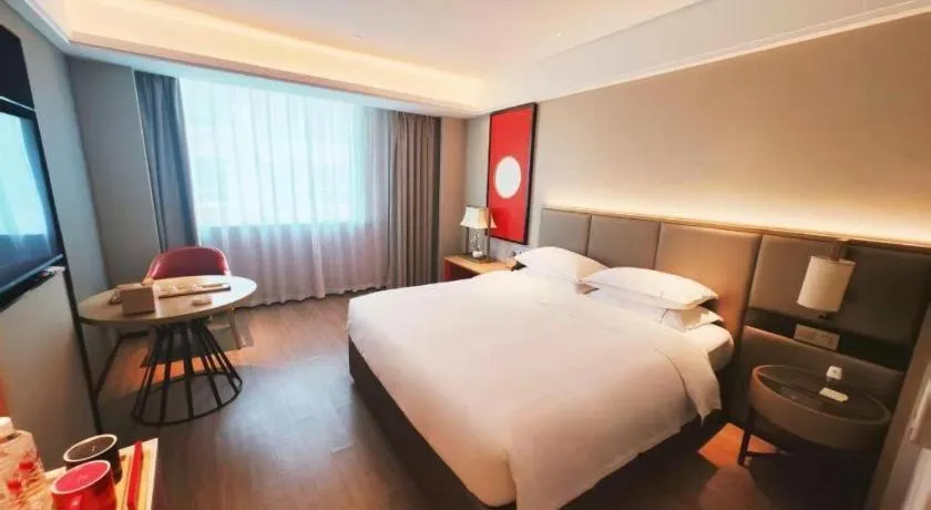 Bed in Echeng Hotel Hezhou Shizheng Square