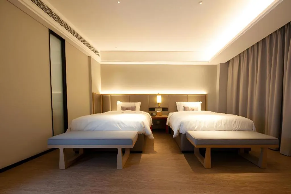 Bed in Echeng Hotel Hezhou Shizheng Square