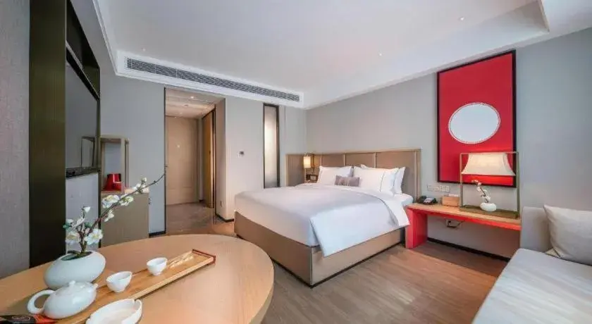 Bed in Echeng Hotel Hezhou Shizheng Square Bed in Echeng Hotel Hezhou Shizheng Square