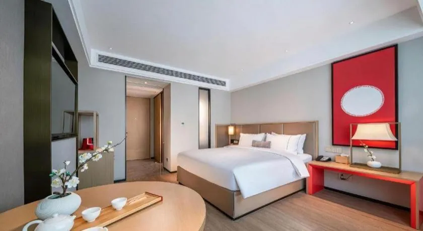 Bed in Echeng Hotel Hezhou Shizheng Square