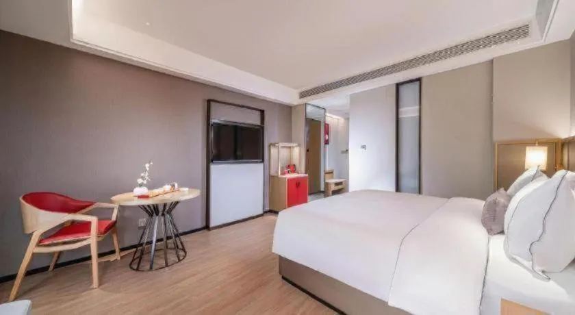 Bed in Echeng Hotel Hezhou Shizheng Square