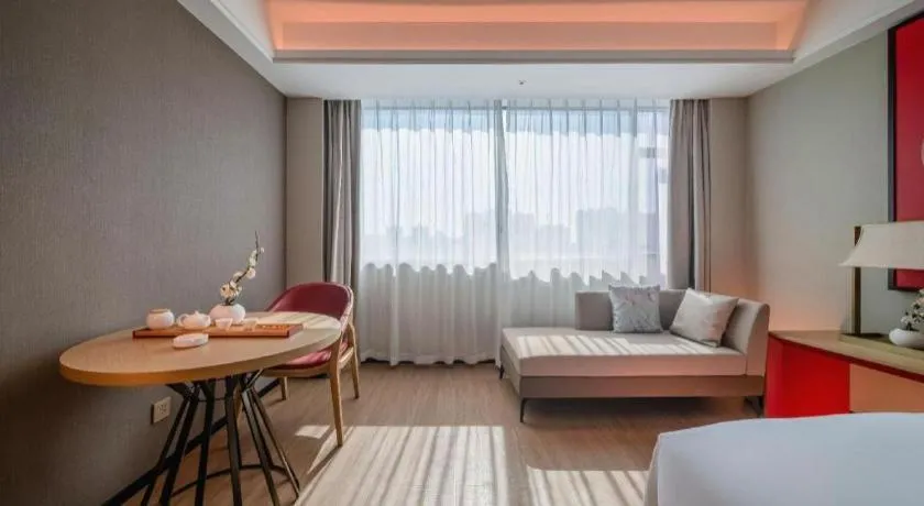 Bed in Echeng Hotel Hezhou Shizheng Square