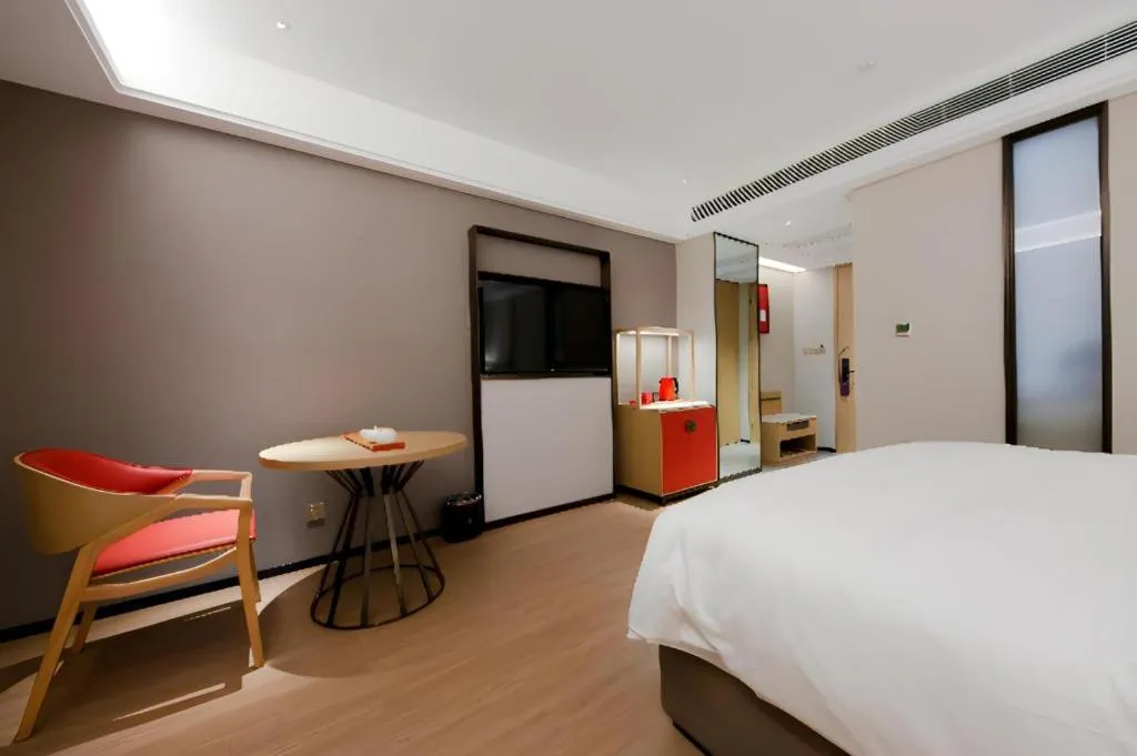 Bed in Echeng Hotel Hezhou Shizheng Square