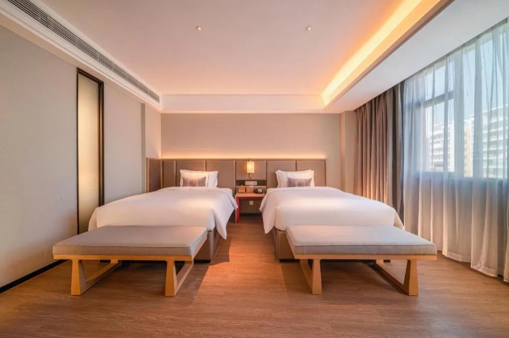 Bed in Echeng Hotel Hezhou Shizheng Square