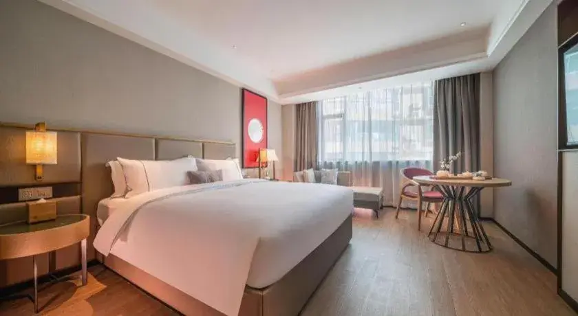 Bed in Echeng Hotel Hezhou Shizheng Square Bed in Echeng Hotel Hezhou Shizheng Square