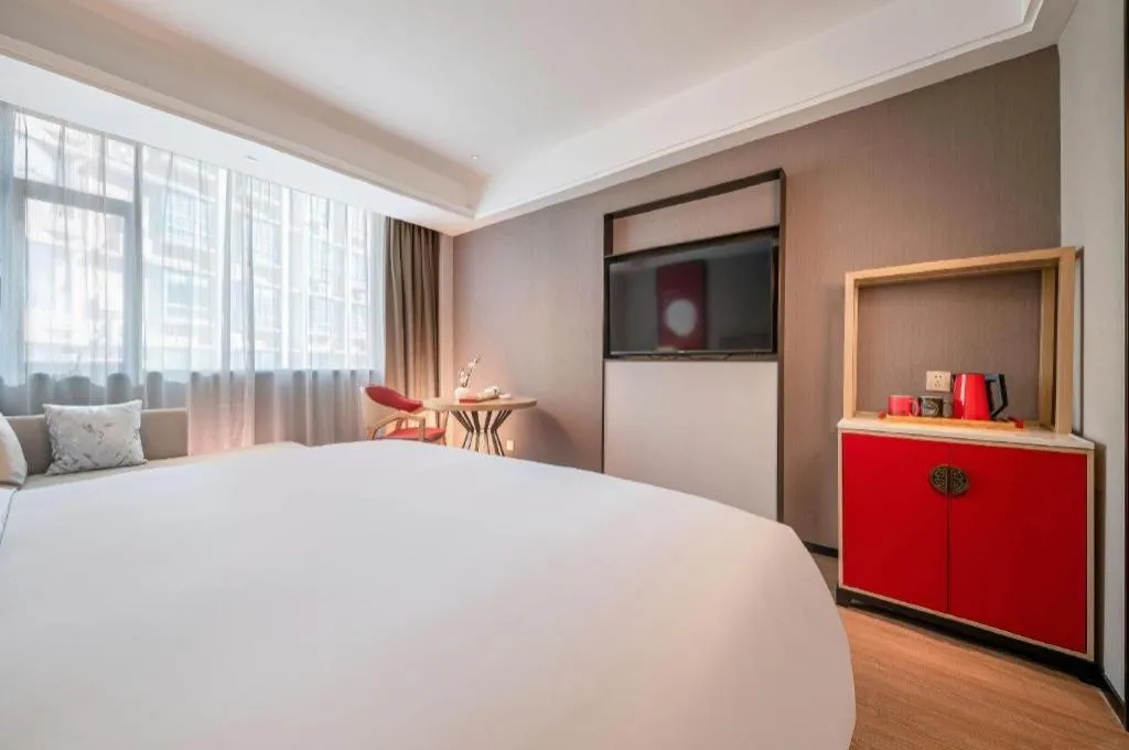 Bed in Echeng Hotel Hezhou Shizheng Square