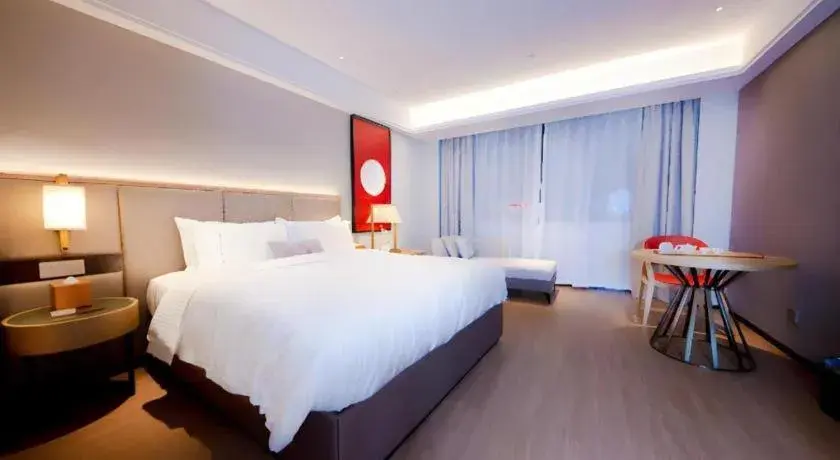Bed in Echeng Hotel Hezhou Shizheng Square Bed in Echeng Hotel Hezhou Shizheng Square