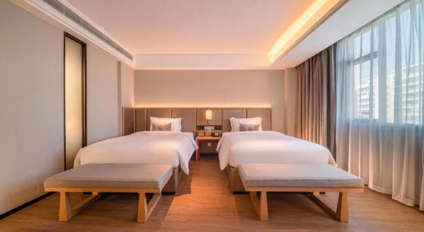 Bed in Echeng Hotel Hezhou Shizheng Square
