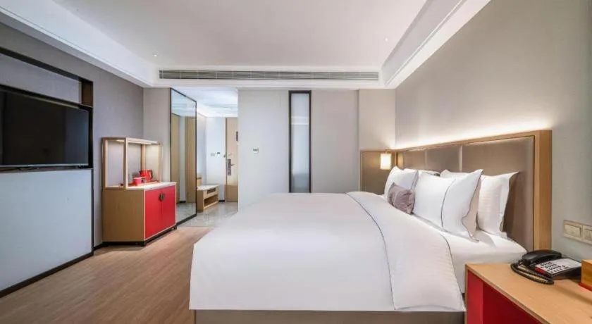 Bed in Echeng Hotel Hezhou Shizheng Square