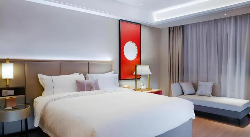 Bed in Echeng Hotel Hezhou Shizheng Square