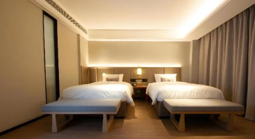 Bed in Echeng Hotel Hezhou Shizheng Square