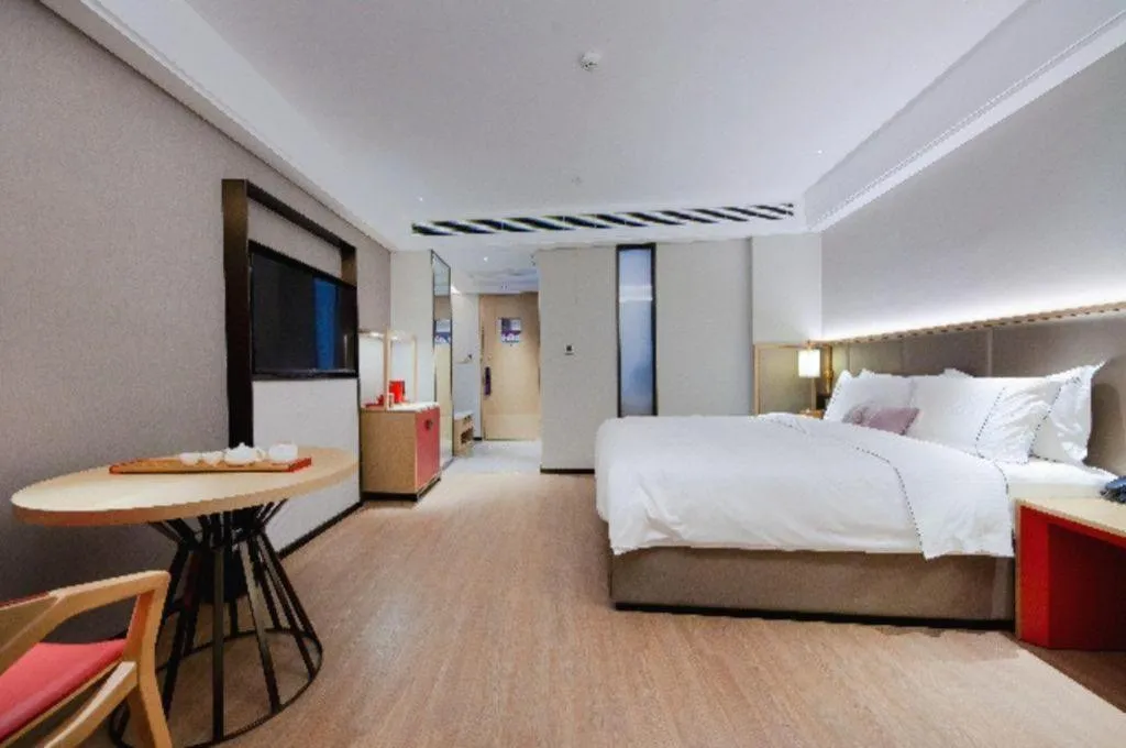 Bed in Echeng Hotel Hezhou Shizheng Square