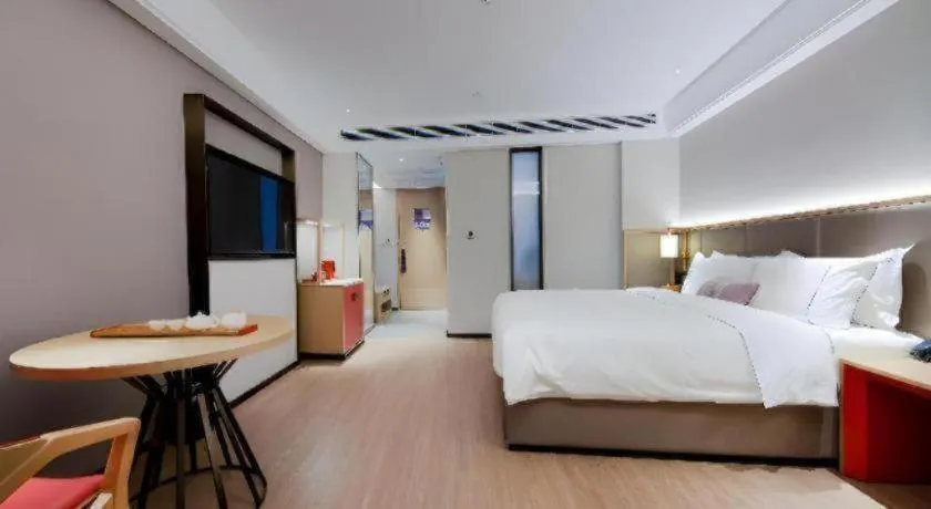 Bed in Echeng Hotel Hezhou Shizheng Square