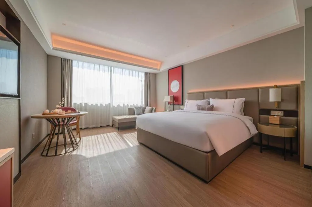 Bed in Echeng Hotel Hezhou Shizheng Square