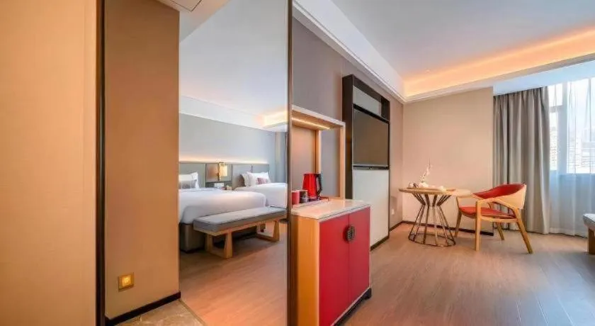 Bed in Echeng Hotel Hezhou Shizheng Square