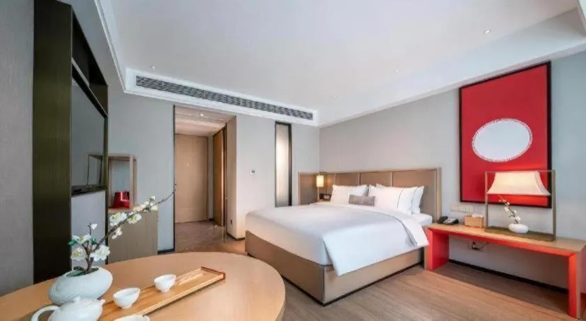 Bed in Echeng Hotel Hezhou Shizheng Square