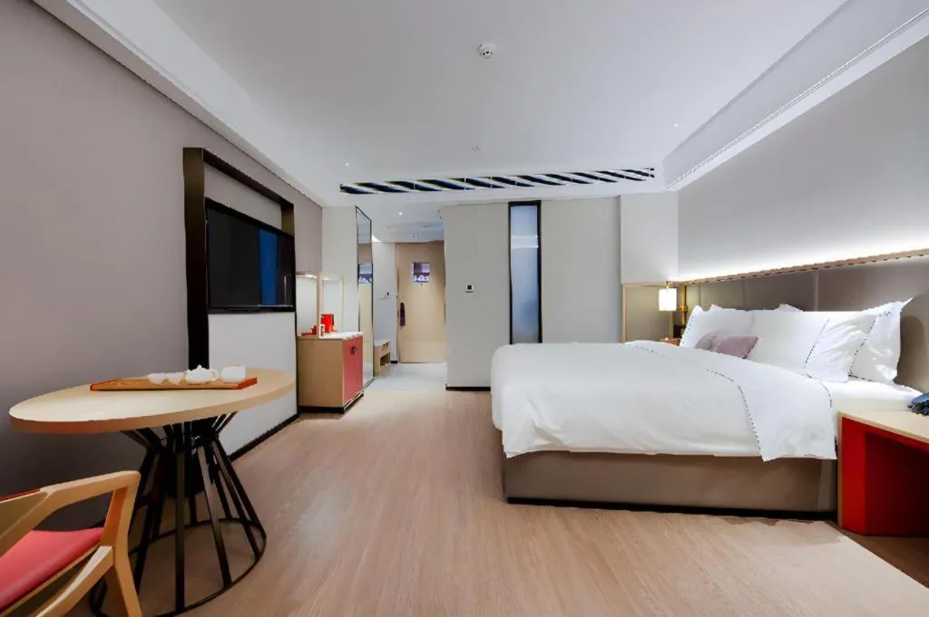 Bed in Echeng Hotel Hezhou Shizheng Square