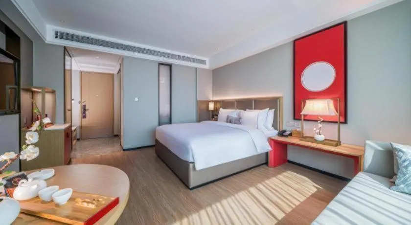 Bed in Echeng Hotel Hezhou Shizheng Square