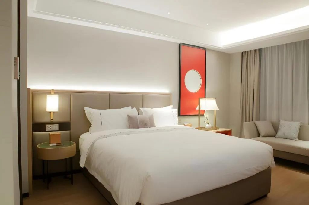 Bed in Echeng Hotel Hezhou Shizheng Square