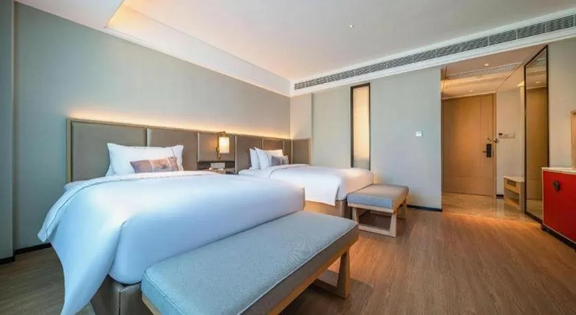 Bed in Echeng Hotel Hezhou Shizheng Square