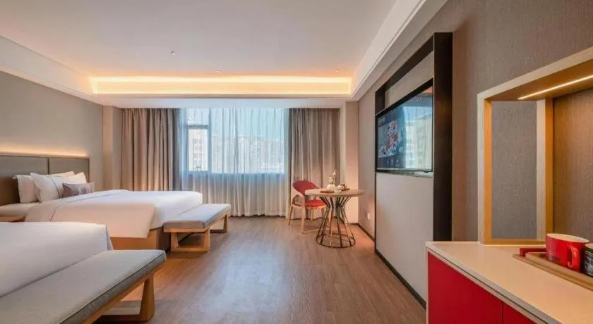 Bed in Echeng Hotel Hezhou Shizheng Square