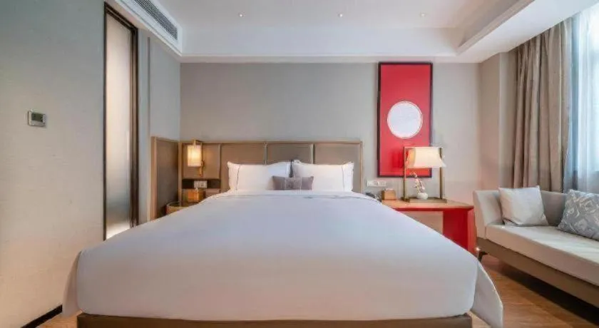 Bed in Echeng Hotel Hezhou Shizheng Square