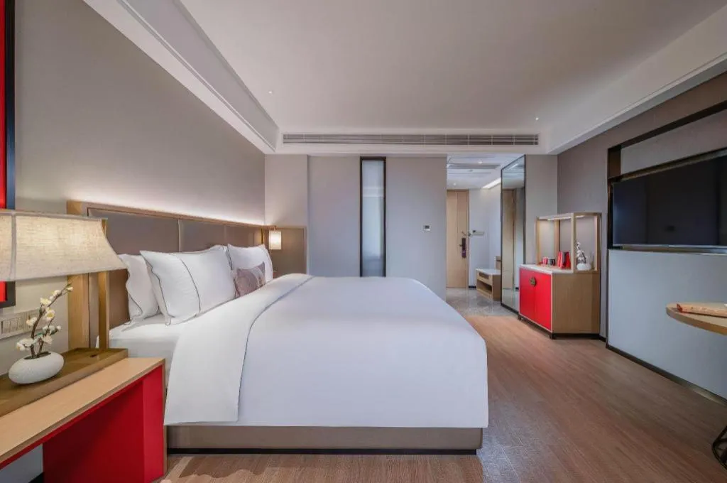 Bed in Echeng Hotel Hezhou Shizheng Square