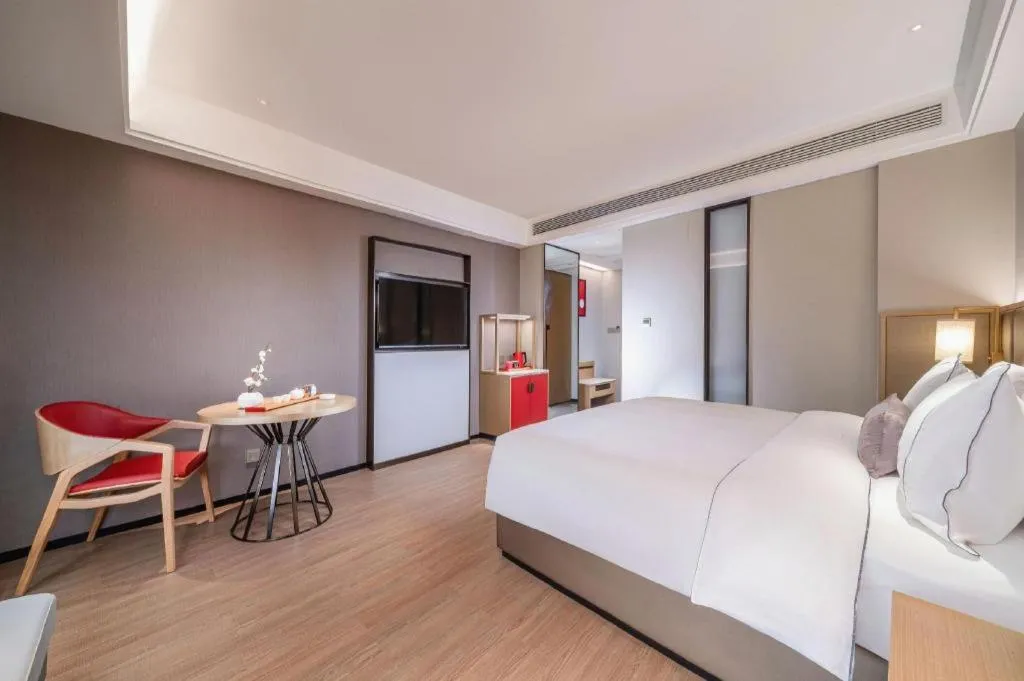 Bed in Echeng Hotel Hezhou Shizheng Square