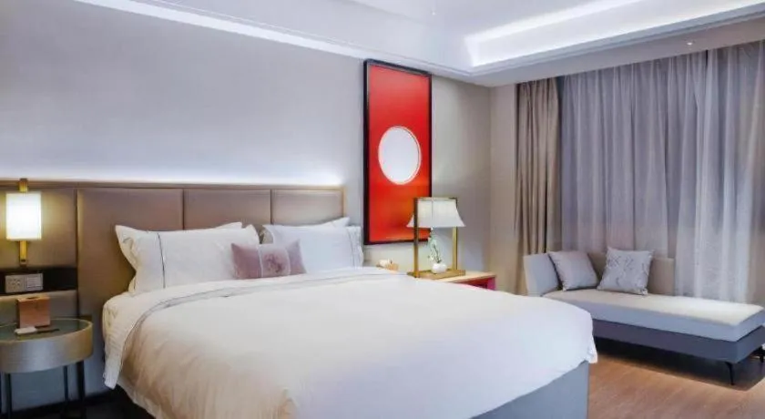 Bed in Echeng Hotel Hezhou Shizheng Square