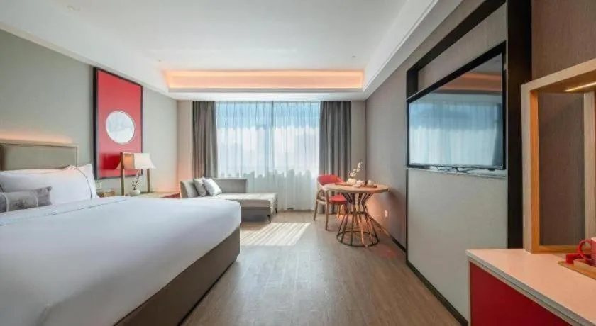 Bed in Echeng Hotel Hezhou Shizheng Square