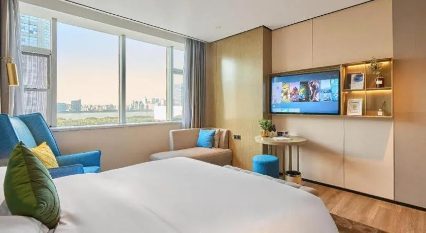 Bed in Echarm Plus Hotel Hangzhou Binjiang Xingguang Avenue