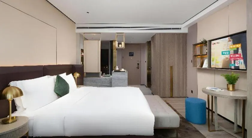 Bed in Echarm Plus Hotel Hangzhou Binjiang Xingguang Avenue