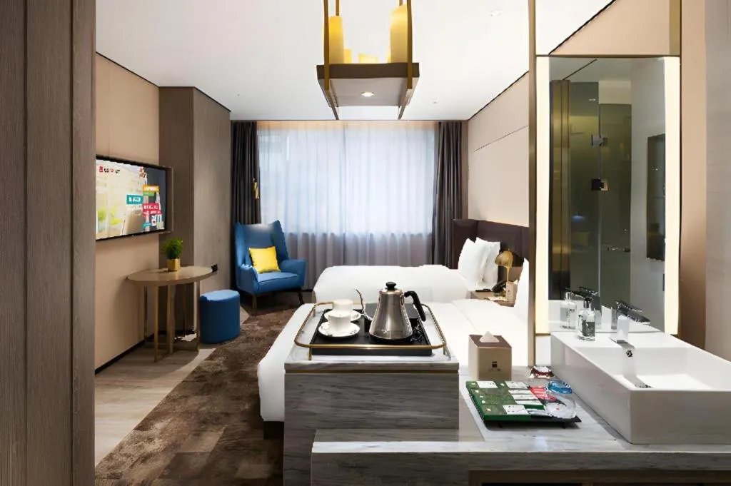 Bed in Echarm Plus Hotel Hangzhou Binjiang Xingguang Avenue