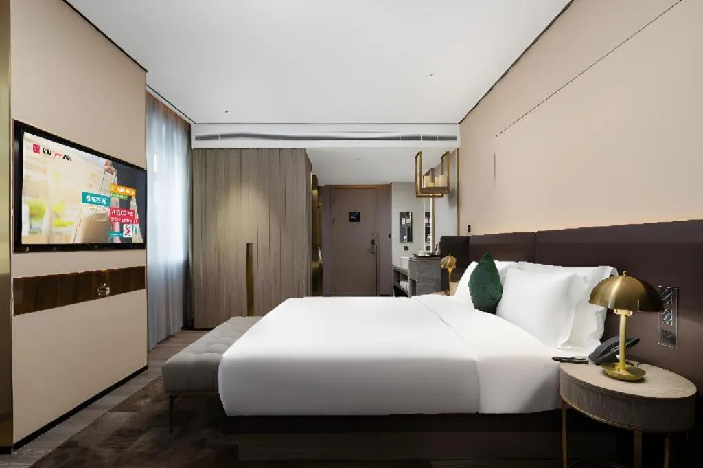 Bed in Echarm Plus Hotel Hangzhou Binjiang Xingguang Avenue