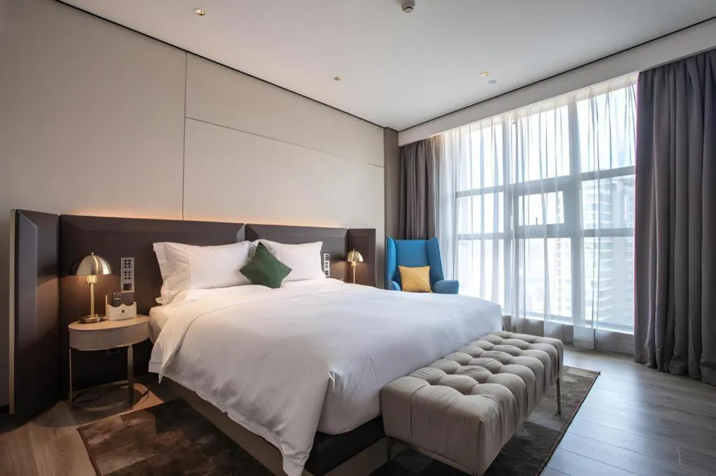 Bed in Echarm Plus Hotel Hangzhou Binjiang Xingguang Avenue