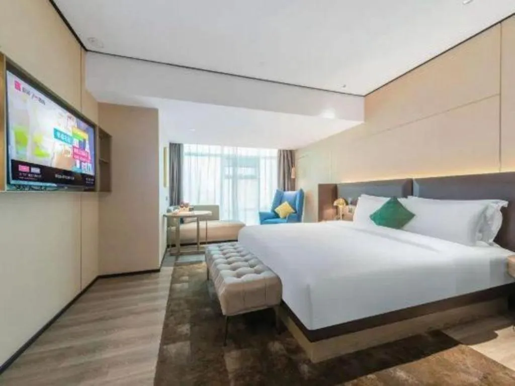 Bed in Echarm Plus Hotel Hangzhou Binjiang Xingguang Avenue