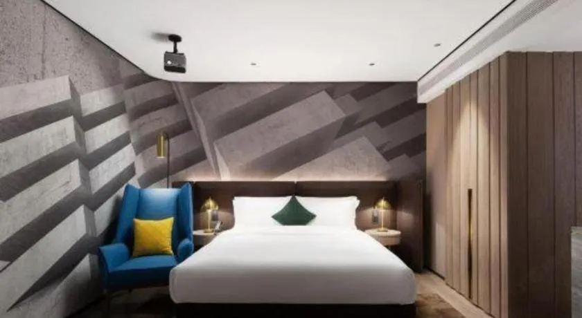 Bed in Echarm Plus Hotel Hangzhou Binjiang Xingguang Avenue